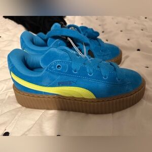 Puma Kids Vibrant Blue Sneakers with Neon Yellow Stripe